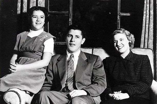 Stanley and Madelyn Dunham pose with Obama’s mother Ann in a photograph probably taken in the 1950s. Born in Kansas, Obama’s maternal grandparents lived in four states before settling in Hawaii.