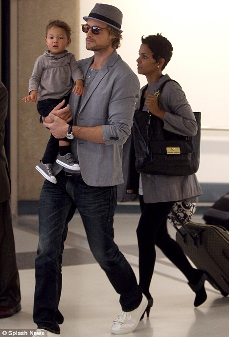 Actress Halle Berry, Gabriel Aubry and their daughter Nahla arrive into Los Angeles International Airport 